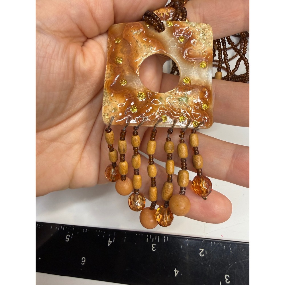 Multistrand Seed Bead Necklace Square Resin Pendant Wood Fringe Amber Tones